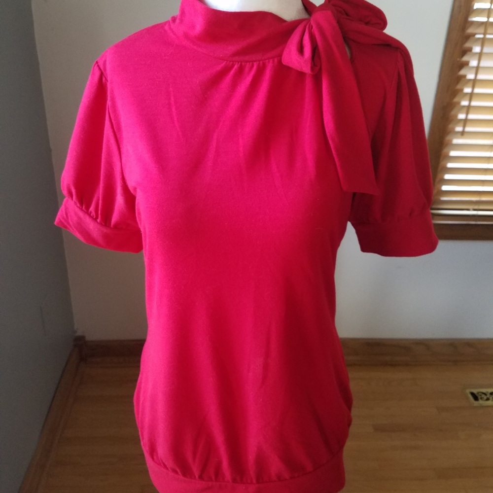 Red tie-neck blouse